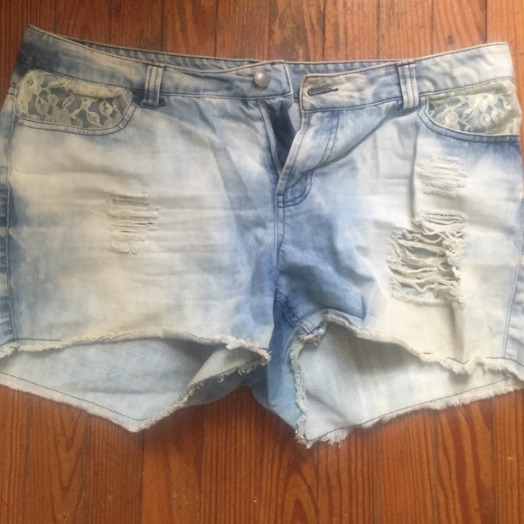 Distressed denim shorts
