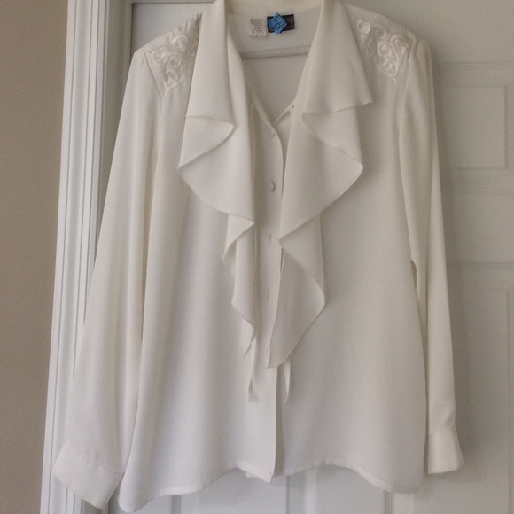 White Size Large ruffle down top w/ design.