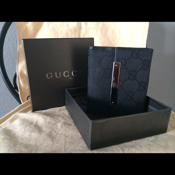 Authentic Gucci wallet with black Gucci pattern