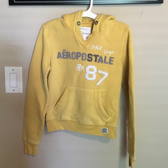 Yellow sweatshirt with a hood