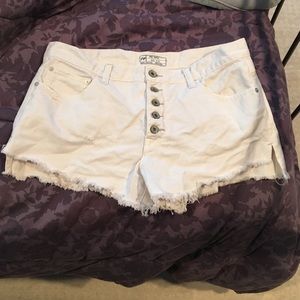 FP white distressed high waisted shorts