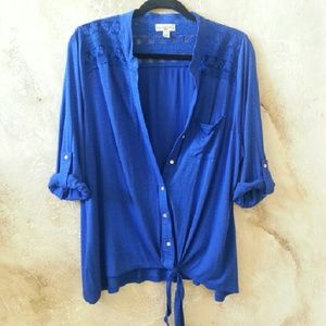 Can be worn open or closed tied at bottom