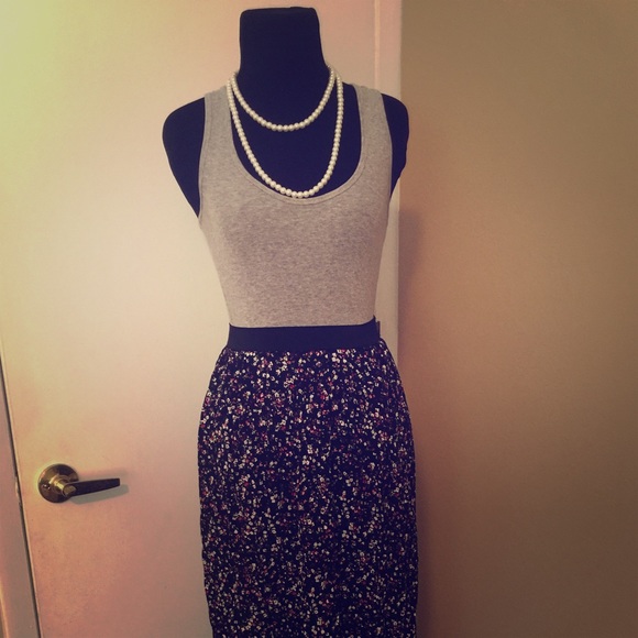 Floral maxi skirt and gray razor back tank top.