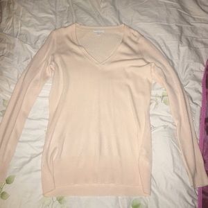 Light pink, very soft sweater never worn!