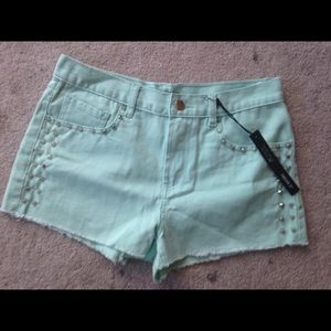 Studded denim shorts