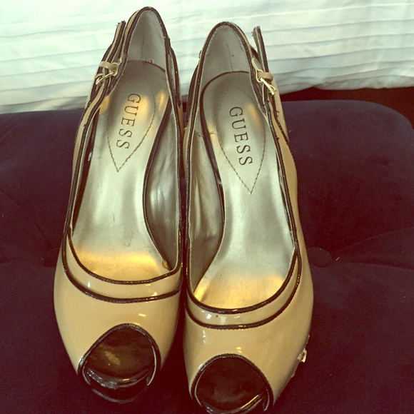 Tan and black Guess platform heels