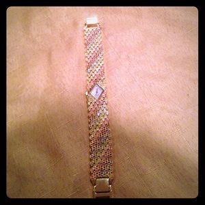 Ladies' stainless steel timepiece. "Adrienne"