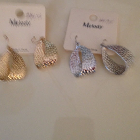 Gold tone and silver tone earrings