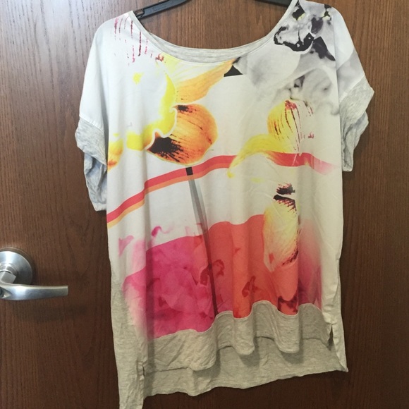 Patterned front t-shirt with a solid back.