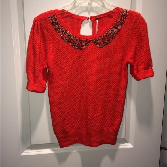 Bright red, short sleeved sweater