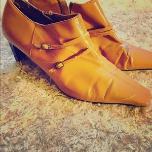 Faux leather ankle boots.