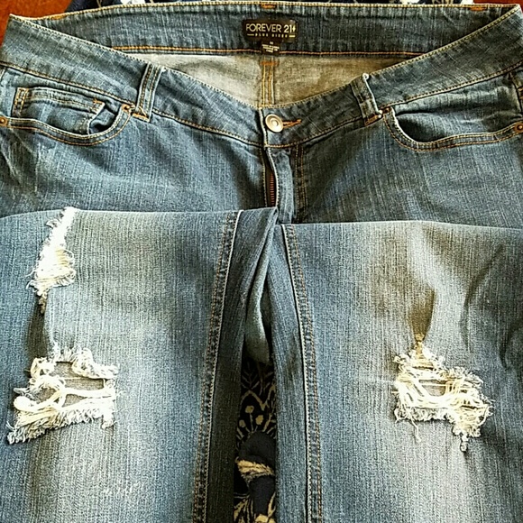 Distressed blue jeans