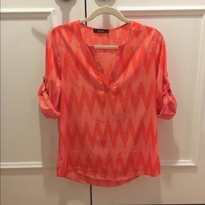 Orange and white chevron blouse