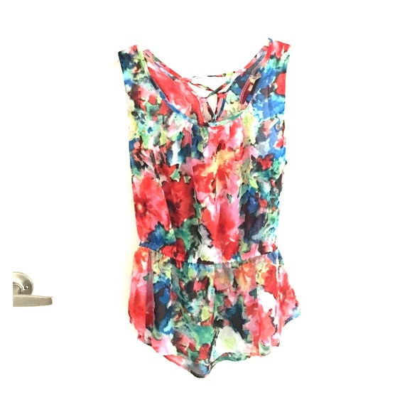 Sheer floral blouse with cute lace-up detail!