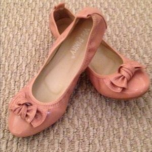 A pair of blush pink ballet flats size 7.5