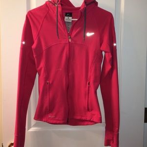 Pink/coral Nike half zip up hoodie.