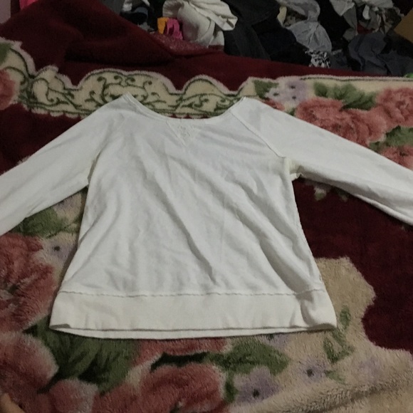 White sweater with back flower pattern