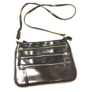 Thin black cross-body with zippers