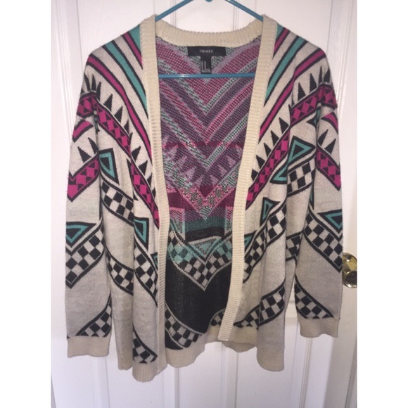 Cream cardigan with blue, pink, and black