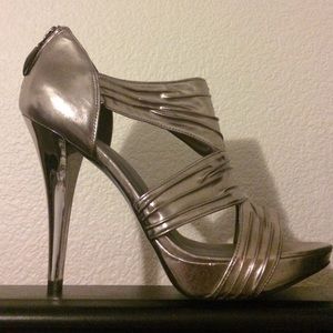 Guess heels silver. Never been worn!!
