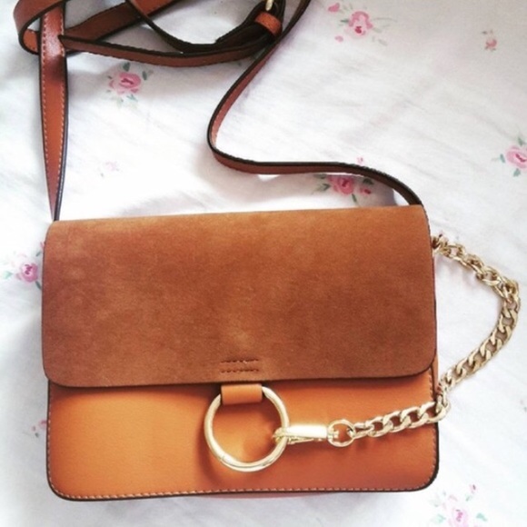 Brown gold circle cross body purse