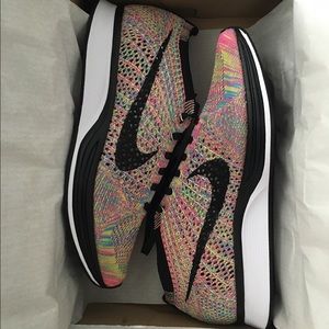 NIKE • 2016 Multicolor Flyknit Racer • Size 6.5