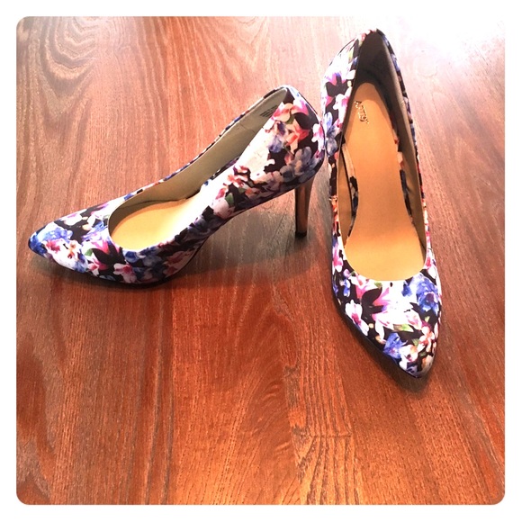 Floral stilettos with silver heel.
