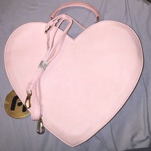 BRAND NEW Light pink heart purse.