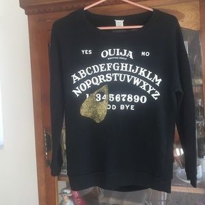 Ouija board sweater.