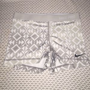 White pattern Nike pro shorts