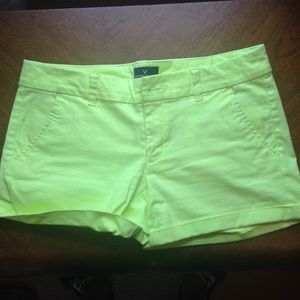 Neon yellow denim shorts