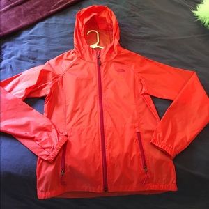 Orange north face rain jacket