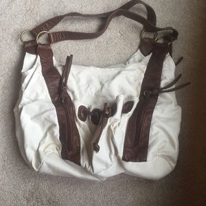 White and brown leather bag