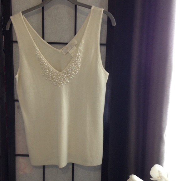 Low back tank with pearl detailing in cream size M