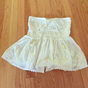 Sleeveless, peplum style shirt