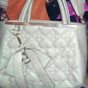 Crossbody gold/beige small purse .