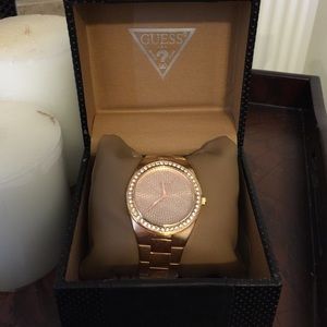 Gold and diamond Guess watch