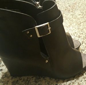 Black cut-out peep-toe wedge bootie