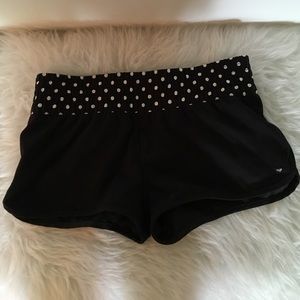Black Roxy Lounge shorts with polka dot waistband