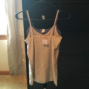 Two tank tops sold together.