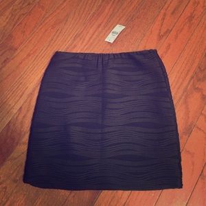 Adorable black mini skirt!
