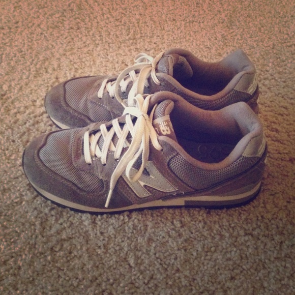 New Balance grey tennis shoes.