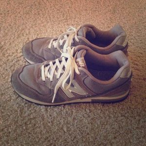 New Balance grey tennis shoes.