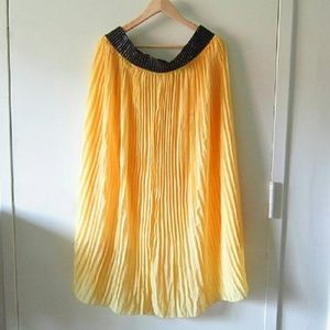 Yellow pleated maxi skirt