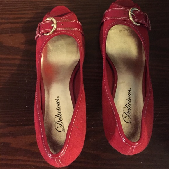Red stilettos with buckle open toed heels