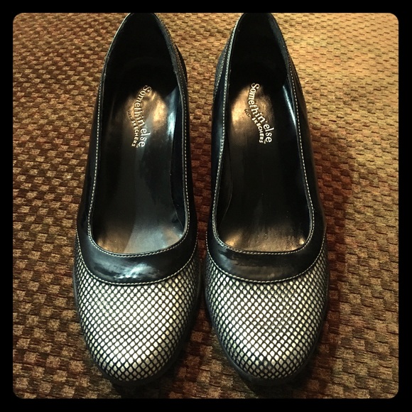 Black heels by Skechers