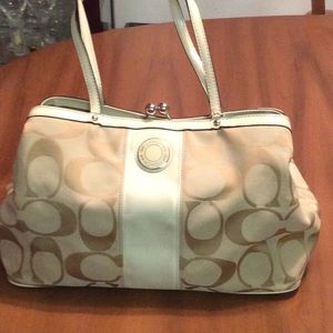 Coach purse with coin clasp