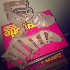 Sandy colored Strapped heels with thick heel
