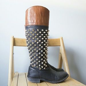 Spike studded leather boots by TBA