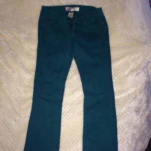 Dark green skinny jeans